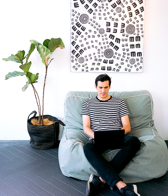 man finishing his tasks with a project planner