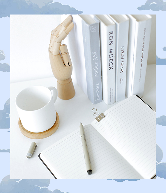 open anxiety journal and books on the table