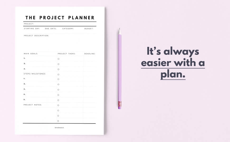 A quote on how to get things done with a display of project planner and pink pencil