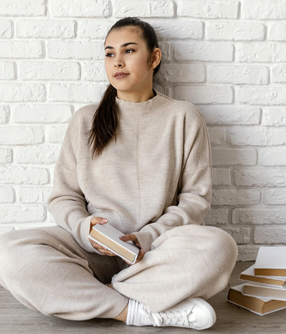 young woman reading books that make you stronger