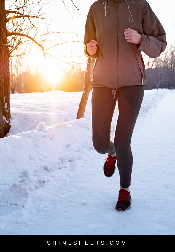 woman jogging outside in winter