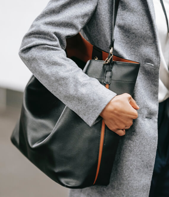 classy woman attire as an example of how to make a good impression