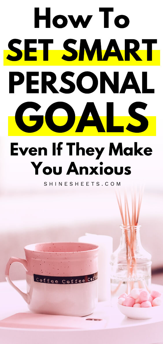Coffee, phone and candies on the table with planner to set personal goals