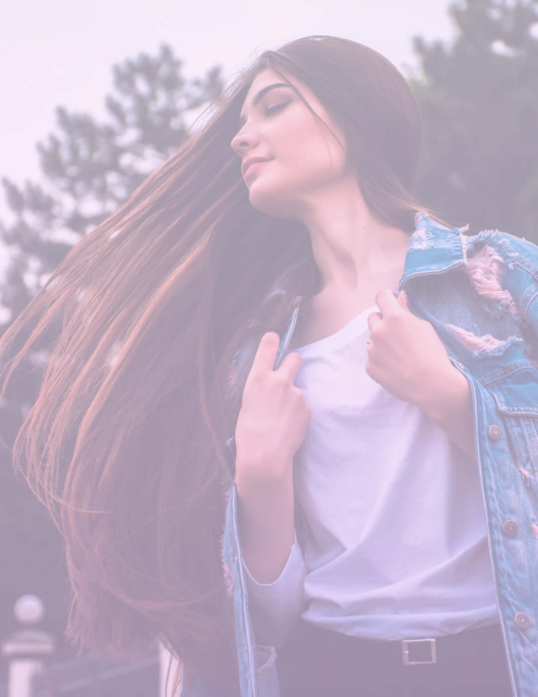 beautiful smiling girl with closed eyes and very long hair