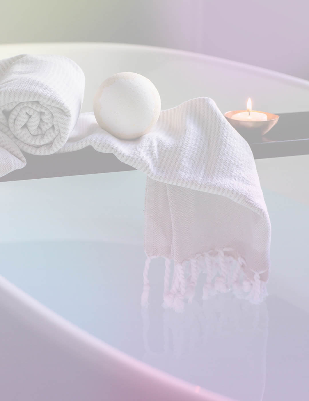 a sensual bath with a candle as an idea on how to get your life together with self care