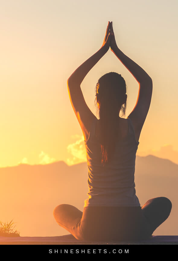 woman practicing spiritual self care by meditating