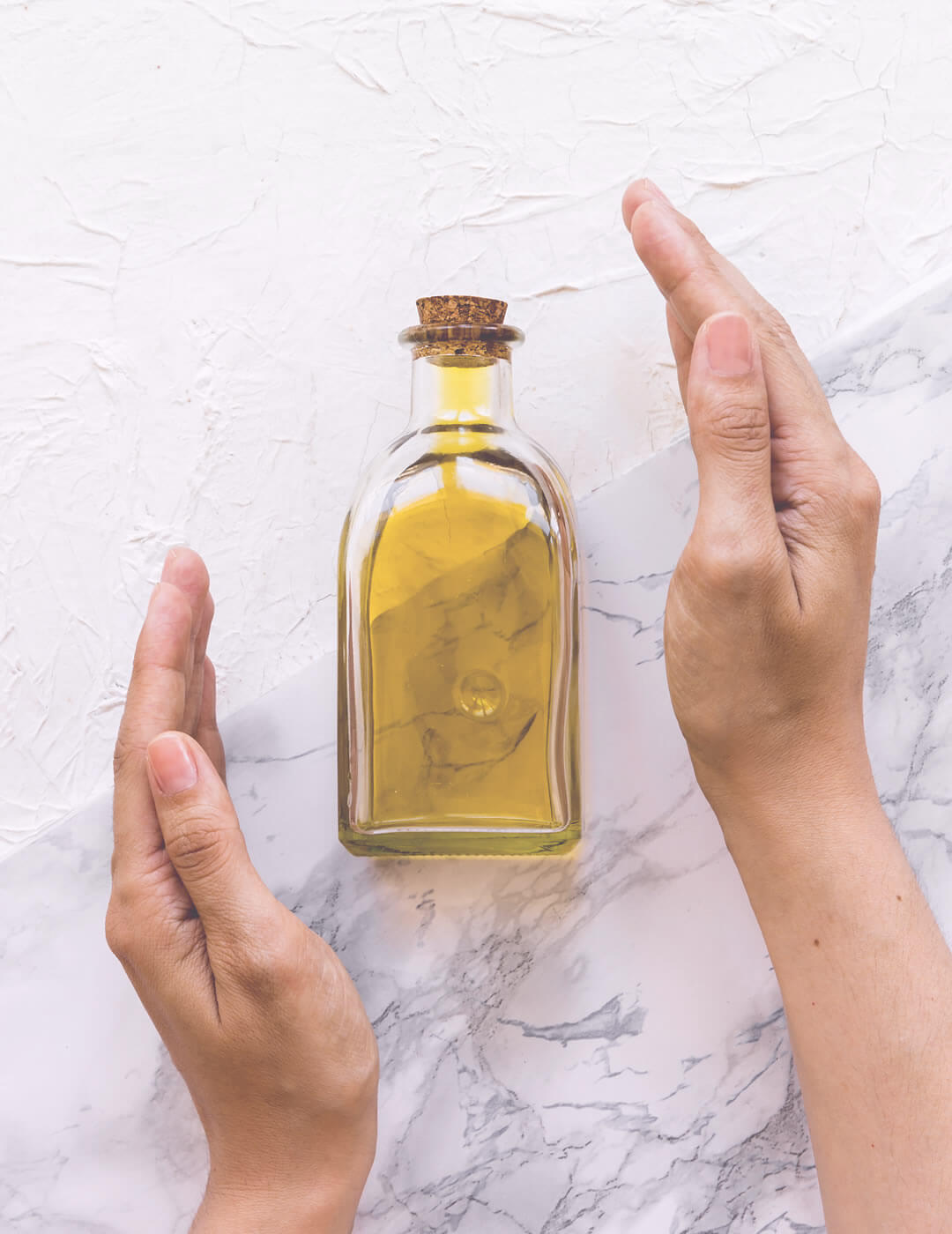 olive oil as one of the best home remedies for dry and frizzy hair