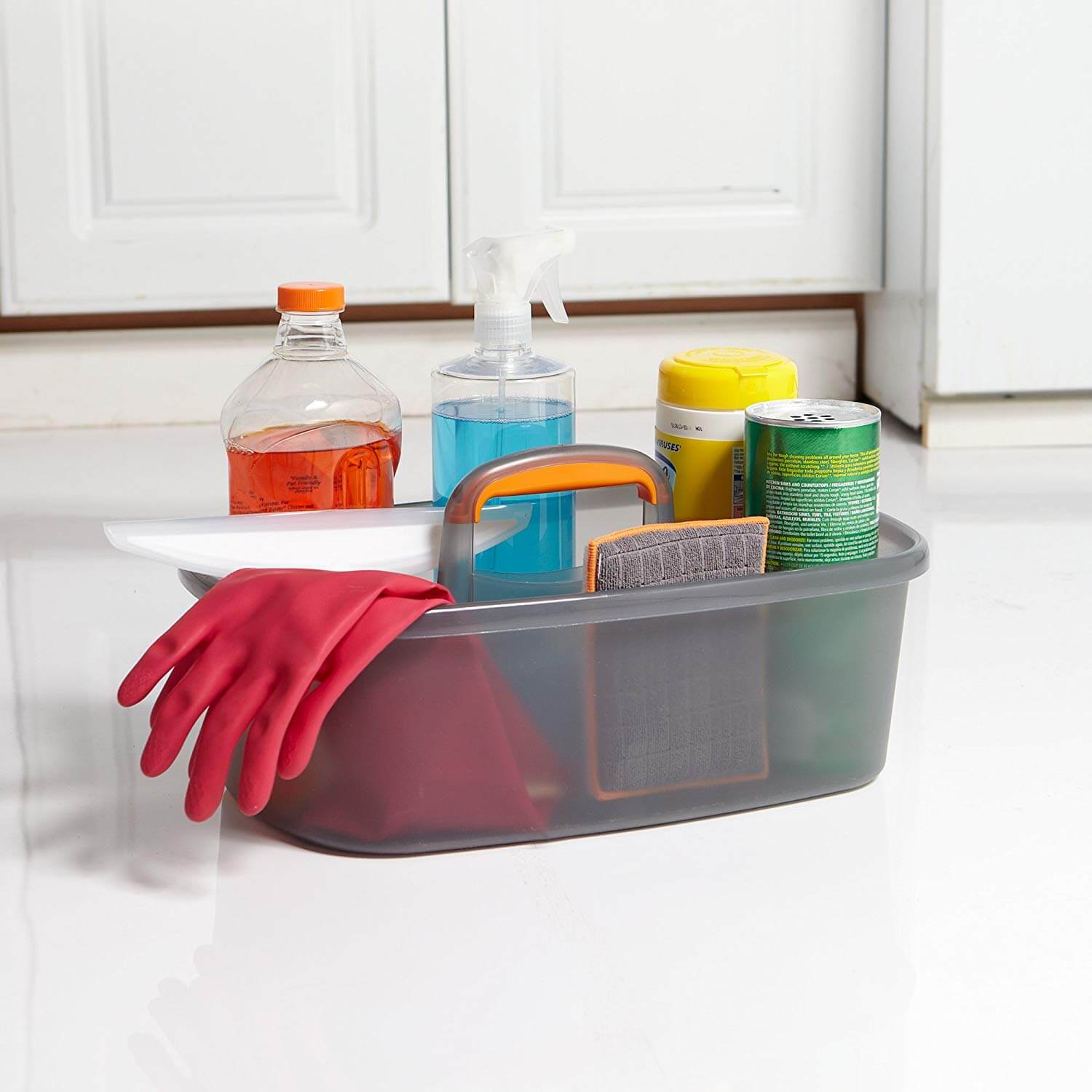 cleaning supplies in a caddy