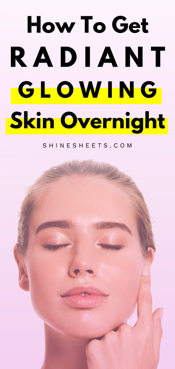 woman touching her glowing skin
