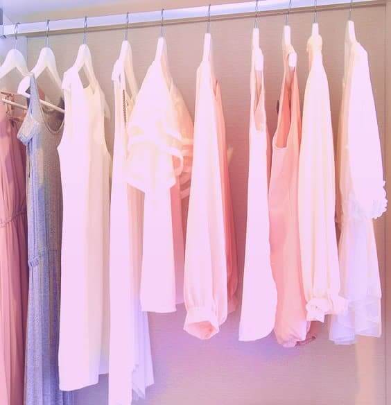 organized clothes in a closet