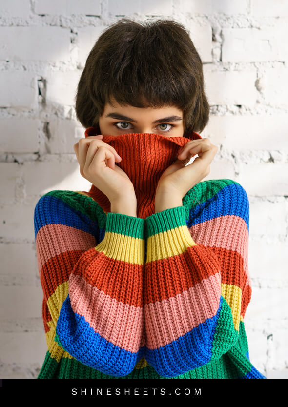 shy woman with a colorful sweater as an illustration of fear of confrontation