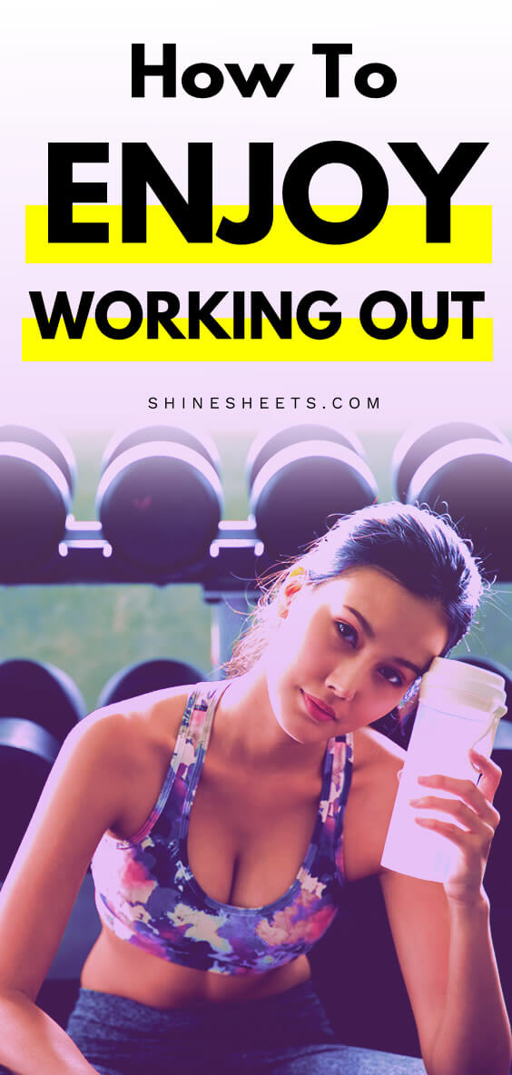 Fit and healthy young woman holds water bottle after her workout