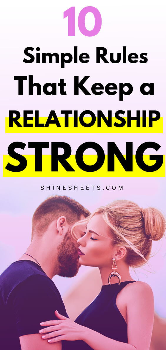 A romantic couple of bearded guy and an elegant blonde girl hugging each other outside