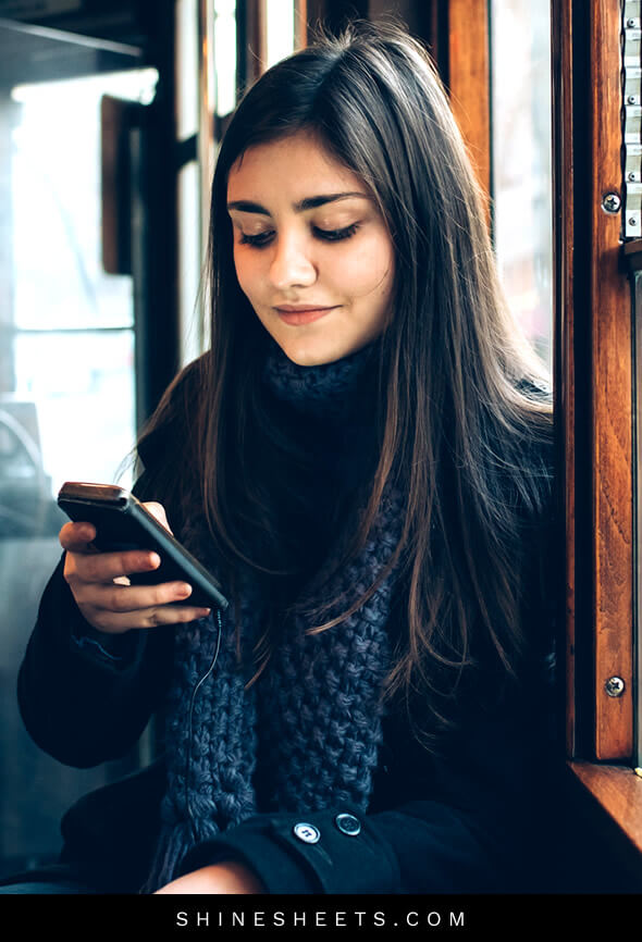woman commuting receives a text message from her crush