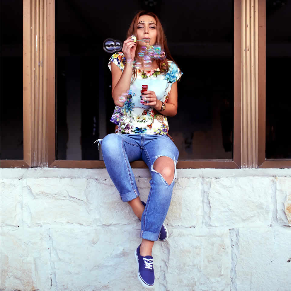happy woman blowing bubbles ilustration of how to stop being indecisive