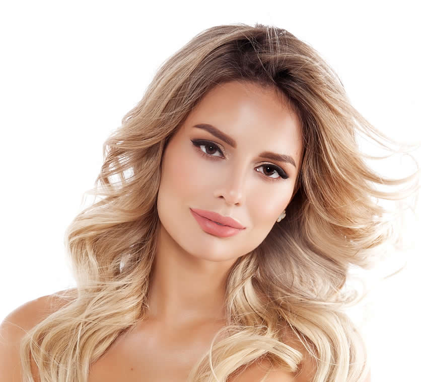 Visual example of how to apply bronzer without looking dirty on a blonde woman with strong facial features