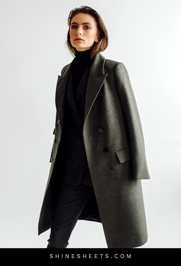 woman with a long coat as an example of how to look expensive