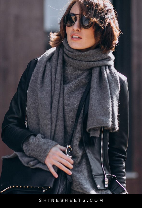 woman with a nice grey scarf as an example of how to look expensive