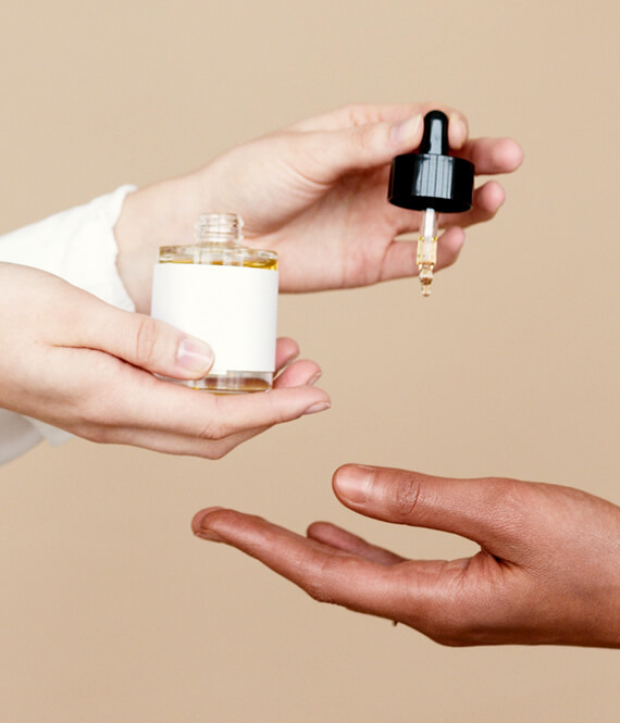 women trying out anti-aging skincare products