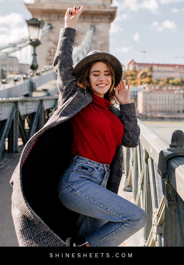 woman with a red sweater shows how to have fun by spending time outside