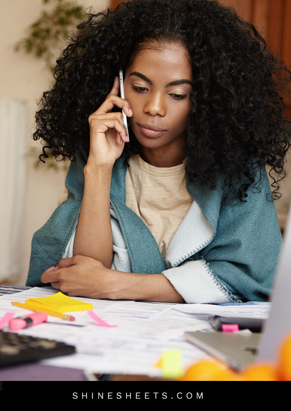 stressed and depressed pretty black woman talking on the phone