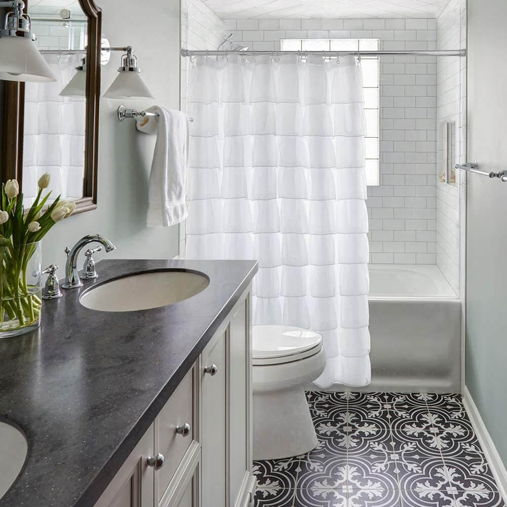 Neat and clean white bathroom shower curtain with ruffles