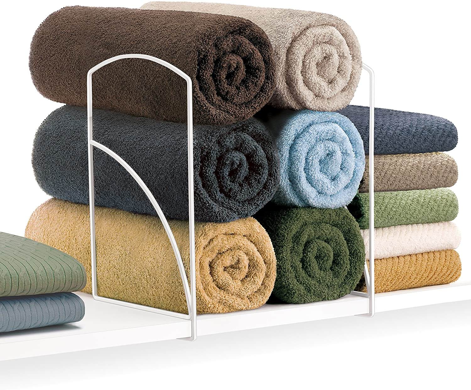 Linen shelf dividers with neat and clean towels