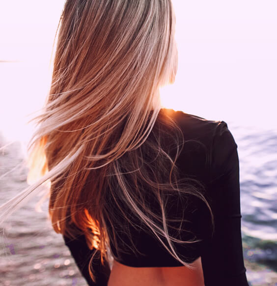 Long blonde hair after using tips for healthy hair