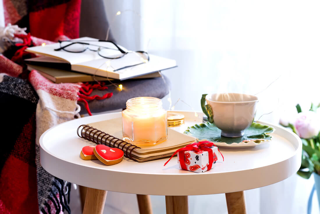 Journals, candles and tea as ways to practice self love