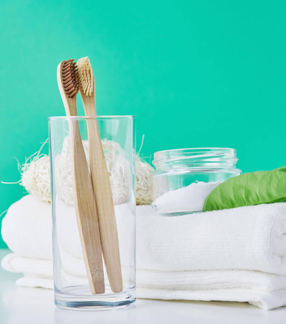 Bamboo tooth brushes and baking soda as teeth whitening home remedies