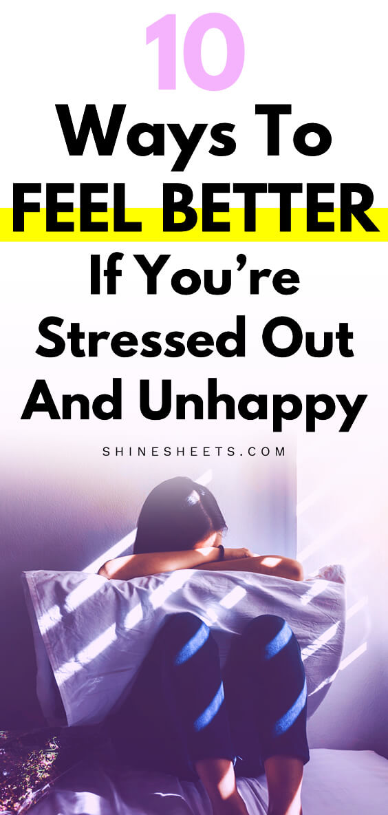 woman that is crying in her pillow because she doesn't feel good