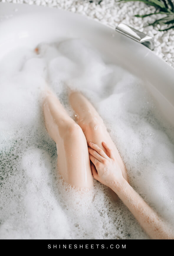 woman relaxing in a bath after dealing with work overload