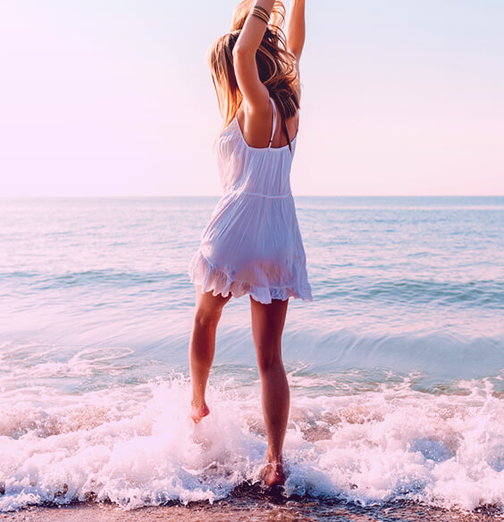 girl enjoying peaceful life at the beach