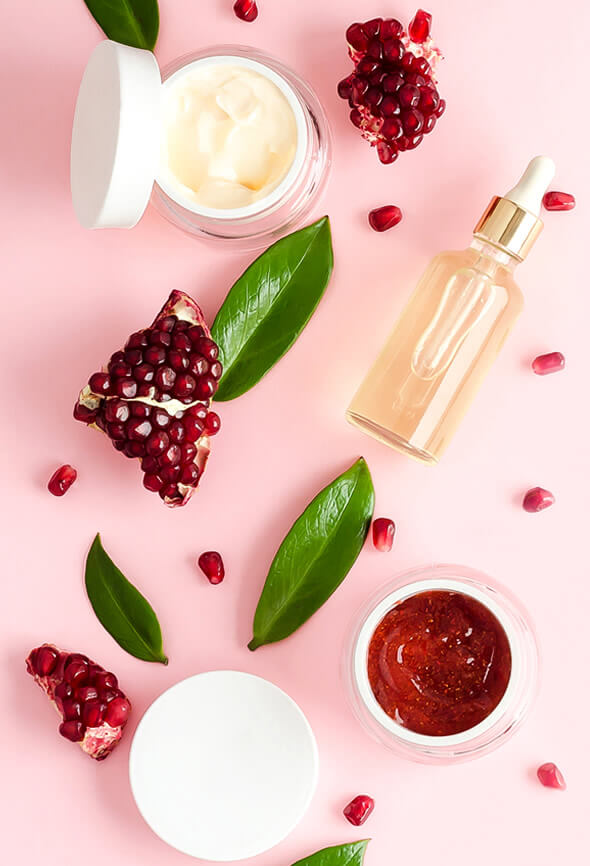 various types of pomegranate enzyme peel on pink table