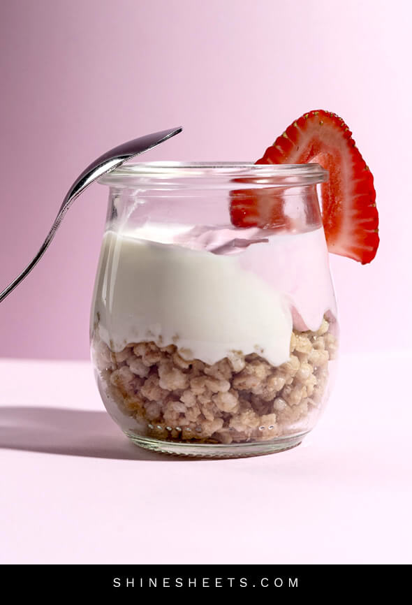 yogurt and granola in a glass as a symbol of healthy beauty habits