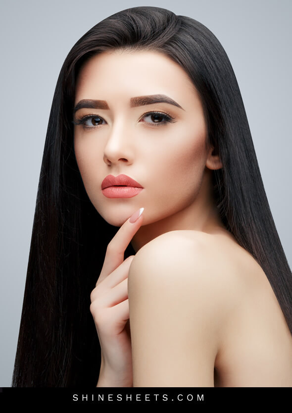pretty long-haired asian woman with hooded eyes