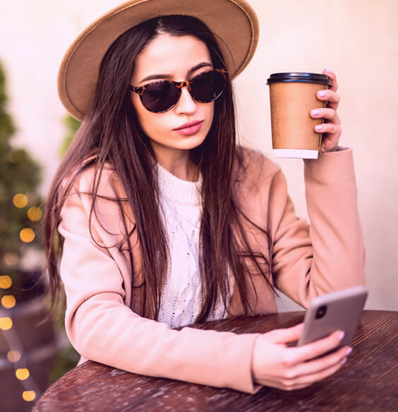 woman with phone anxiety looking at her phone