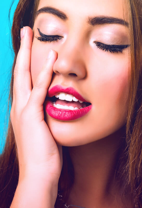 woman with very white teeth and red lipstick