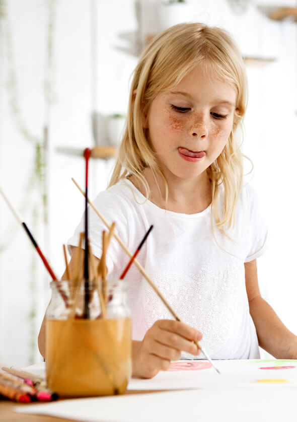 young girl painting