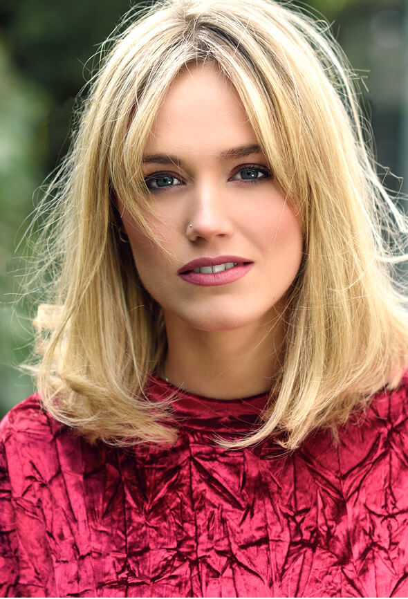 blonde pretty woman with frizzy hair