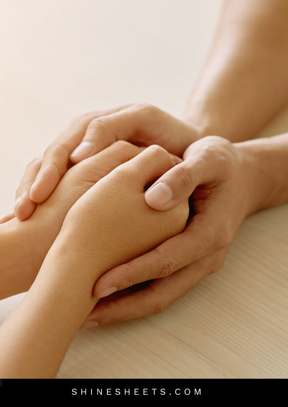 two people holding hands