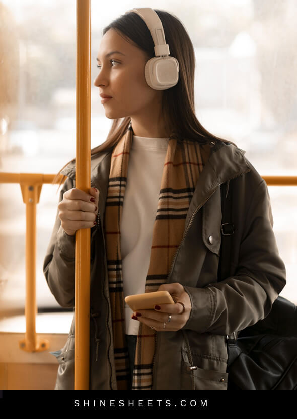 woman listening to music with headphones as an illustration of social etiquette