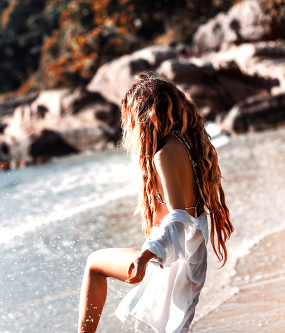 woman playing in the beach