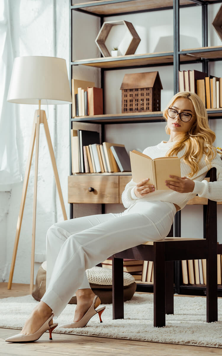 woman reading books to improve intellectual health