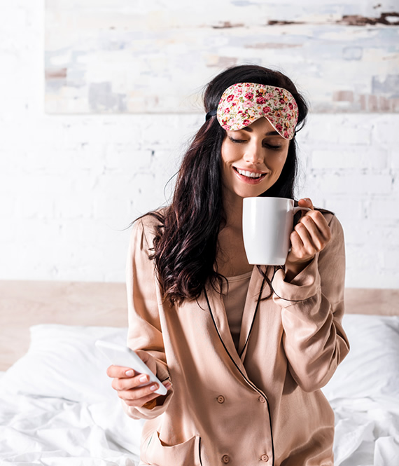 woman woke up after 8 hours of sleep smiling