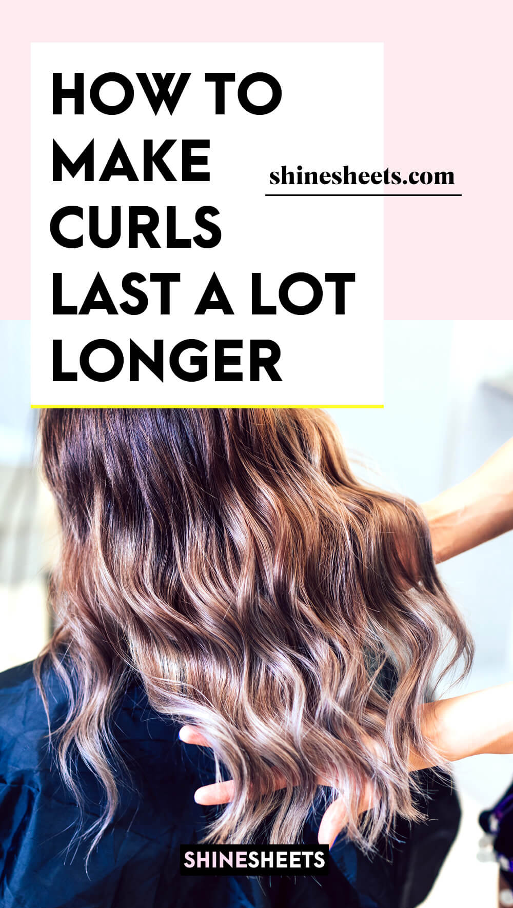 hairstyler showing her client how to make curls last longer