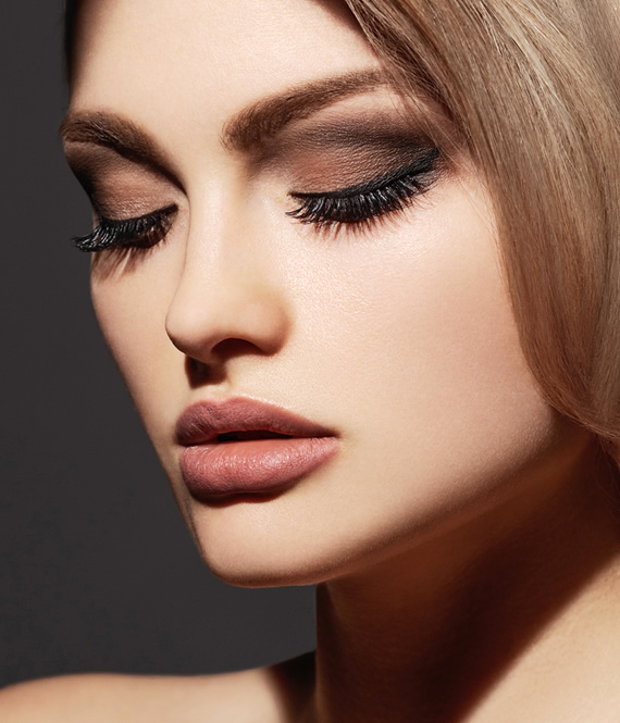 woman with a pretty nose after rhinoplasty