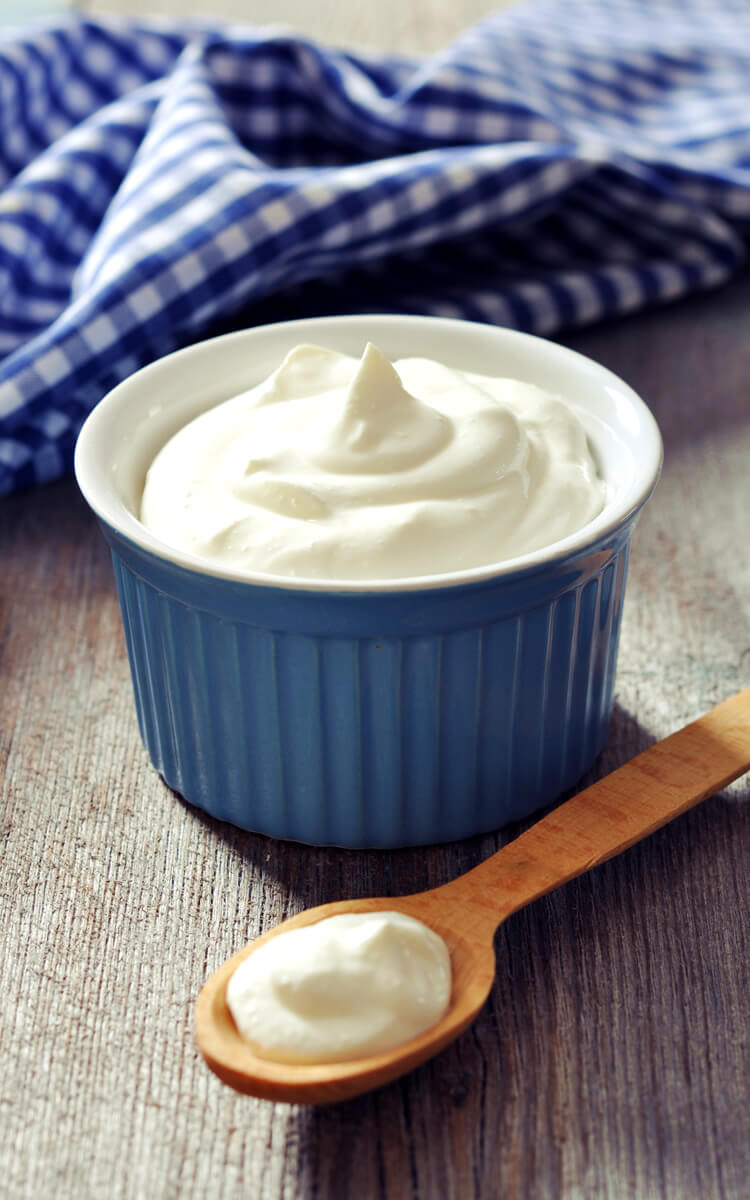 a bowl of greek yogurt on the table, post-workout meal