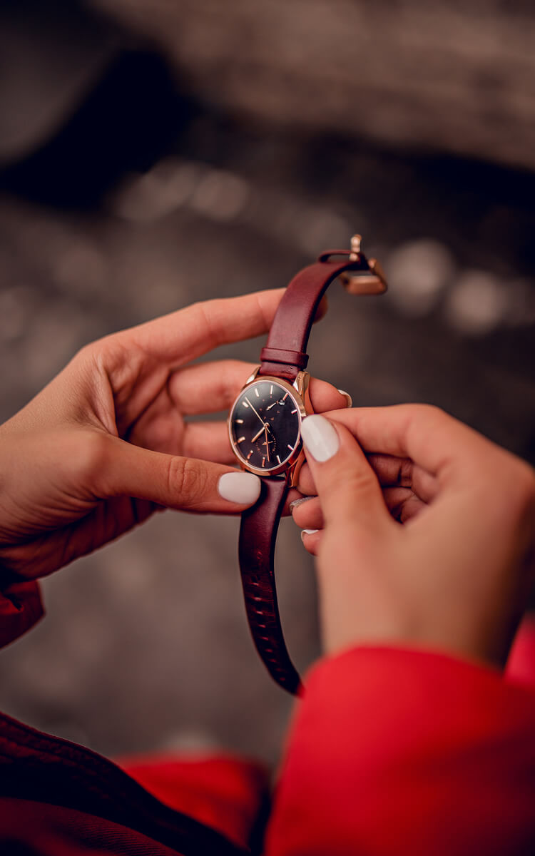 a girl looking at her watch