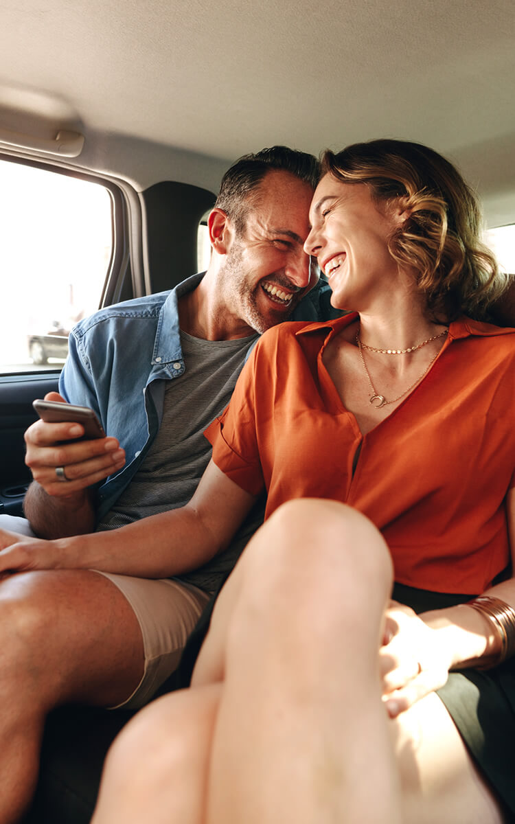 middle-aged, equal couple have fun together laughing